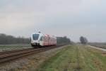 Spurt 10314 “Jopie Huisman” (Arriva) mit Regionalzug 37838 Veendam-Groningen bei Waterhuizen am 3-1-2013.