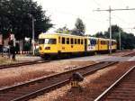 Ich wnsche allen Usern und Admins EINEN GUTEN RUTSCH INS NEUES JAHR!!Hier ist DEII 175 mit Regionalzug 7968 Almelo-Zwolle unterwegs bei Wierden am 6-7-1994.