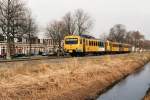 3105 und 3224 mit Regionalzug 8656 Groningen-Leeuwarden in Leeuwarden am 14-3-1995.