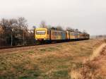 3115, 3118 und 3227 mit Regionalzug 8660 Groningen-Leeuwarden bei Tytsjerk am 28-2-1995.
