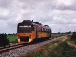 Wadloper 3108 mit einem Regionalzug zwischen Sneek und Stavoren bei Oudega am 15-05-2006.