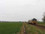  Wadloper  3211 mit Zug 30046 Stavoren-Leeuwarden bei Mantgum am 26-12-2006.