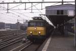 Am 21.1.1989 hlt NS Elektrolok 1138 um 11.00 Uhr mit einem IC nach Enschede  am Bahnsteig in Hengelo.