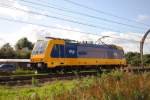 Die erste neue Traxx Lok mit nummer 186001 der N.S.kommt gerade Maartensdijk vorbei auf seinem Weg von der Grenz Bahnhof Emmerich nach Amsterdam Watergraafsmeer.11-08-2014