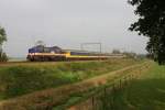 Brummen am 14.10.2006 - Nostalgieverkehr der NS in den Niederlanden!  Im Sandwich fahren Museumlok 1501 und ACTS 1234 einen Intercity in  Richtung Zuitphen.