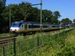 Spinter-2-zug 2112 und Schwester-er als sprinter nach Amersfoort unterfahrt typisches Backsteinviaduckt Bussum-Zuid 23.7.12