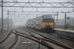 Im Nebel verlsst die NS 7829 Bahnhof 't Harde mit ein Regionalzug nach Zwolle am 20/09/09.