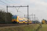 DDZ 7522 mit IC 1944 Venlo-Den Haag CS bei Deurne am 26-2-2015.