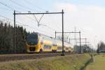 VIRM 9403 mit IC 1938 Venlo-Den Haag CS bei Deurne am 25-2-2015.