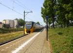 Ein Holländischer Doppeldecker aus Maastricht(NL) nach Alkmaar(NL) und fährt durch Geleen-Lutterade und fährt in Richtung Sittard(NL).