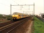 520 und 890 mit Eilzug 3642 Roosendaal-Zwolle auf Bahnhof Elst am 15-5-1996.