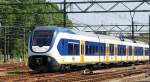 Die neue ET 2400 (2429) mit regionalzug von Utrecht CS - Den Haag CS beim einfahrt in Den Haag am 03.