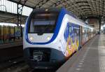 ET 2400 (2443) Mit Regionalzug Haarlem - Zandvoort am 15. Juli 2010 in Hbf Haarlem.