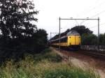 4234 und 4051 mit IC 20747 Amsterdam CS-Leeuwarden bei Baarn am 12-6-1999.