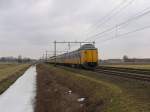 Koplopers 4219 und 4223 mit IC 744 Groningen CS-Schiphol bei Haren am 19-2-2010.