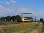 Eine Koploper mit Regionalzug 9134 Groningen-Zwolle bei Tynaarlo am 30-7-2010.