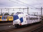 Am 15.7.1989 trug der Koplooper 4012 eine  Aegon  Werbung.
Hier begegnete mir der Werbetrger im Bahnhof Amersfoort.