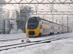 BR 8400 mit Schnellzug Breda - Amsterdam beim einfahrt in BHF Haarlem.