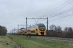 VIRM 8659 mit IC 754 Groningen-Den Haag CS bei Tynaarlo (De Punt) am 3-1-2013.