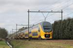 VIRM 8671 mit IC 1937 Den Haag CS-Venlo bei Deurne am 25-2-2015.