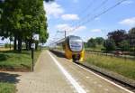 Ein Nachschuss von einem Holländischer Doppeldecker aus Maastricht(NL) nach Alkmaar(NL) und fuhr durch Geleen-Lutterade und fährt in Richtung Sittard(NL). 
Aufgenommen in Geleen-Lutterade(NL). Bei schönem Sommerwetter am Mittag vom 14.6.2015.