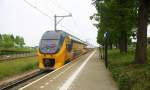 Ein Holländischer Doppeldecker aus Alkmaar(NL) nach Maastricht(NL)  und fährt durch  Geleen-Lutterade und fährt in Richtung Maastricht(NL).