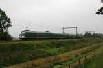 Ganz in Grn kommt ein Elektrotriebzug der NS bei Brummen daher.
Am 14.10.2006 fuhr dieses Fahrzeug mit im Nostalgie Verkehr im
planmigen Dienst. Der Zug ist hier auf dem Weg nach Arnhem.