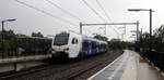 Ein Holländischer Regionalzug kommt aus Maastricht-Randwyck(NL) nach Heerlen(NL) und hält in Heerlen-Woonboulevard(NL) und fährt dann weiter in Richtung Heerlen(NL).