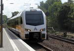 Ein Holländischer Regionalzug aus Aachen-Hbf(D) nach Maastricht(NL) und kommt aus Richtung Aachen-West,Laurensberg,Richterich und fährt durch Kohlscheid in Richtung Herzogenrath.