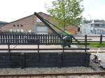 Bahnhof Wognum Nibbixwoud am 7.9.2014, Ladekran am Ende der Ladestraße  - unterwegs mit der Museum Stoomtram von Dorf zu Dorf durch das westfriesische Flachland von Medemblick nach Hoorn