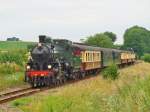 Die 1289 der Sdlimburgischen Dampfeisenbahngesellschaft, Baujahr 1916, vorgesehen fr den Einsatz vor schweren Personenzgen und Schnellzgen hat keine Probleme die 6 Wagen die leichte Steigung nach