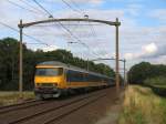 Eine ICR-Steuerwagen fahrt im Abendlicht mit Lok 1756 und IC 1966 Venlo-Den Haag CS bei Vlierden am 17-7-2012.