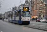 Die GVB 911 mit linie 5 nach Amstelveen hier am Nieuwezijds in Amsterdam am 12.02 2011.