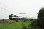NS 1648 mit IC-2306 (Köln - Amsterdam) bei Veenendaal De Klomp am 14.10.1990, 12.27u.