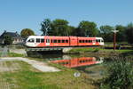 Arriva nr 263 als Zug 31134 (Arnhem Centraal - Tiel) passiert die Brücke der Linge in Opheusden, 07.09.2023.
