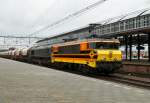 Rail Feeding 4401 (ex NS 1606) in Doppeltraktion mit MRCE 653-05 (Class 66) zieht Silowagen durch Amersfoort am 08-02-2014.