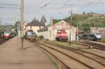 Der Bahnhof Halden mit Bm 73.145, El 14.2177, Skd 226.33 und BM 73.116. Im Hintergund ist die Festung Fredriksten zu sehen; 02.06.2009