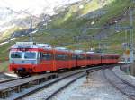 69 669 in modernen Farbdesigne am 14.06.2006 im Bahnhof Myrdal, der Triebzug hat eben das mittlere Gleis fr einen Doppelzug Bm 73 Bergen - Oslo freigemacht.