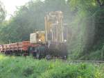 Ein 2 Wegebagger mit einem KS rollt von der Leibenfelderhhe richtung Bhf.Deutschlandsberg (GKB) 31,08,2011  