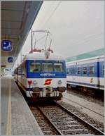 Der ÖBB 4030 310-9 staht in Bregenz zur Abfahrt nach Lindau HBF bereit.