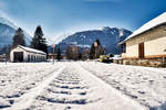 Blick auf den verschneiten Bahnhof Kötschach-Mauthen.