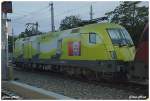 Die Telekom - Lok 1116 033 brachte am 10.10.10..h ich mein 10.10.09 den Transalpin (EC 163 Basel - Wien West) von Buchs SG nach Wien West. Es war schon sehr dmmrig, als ich sie in St.Plten Hbf ablichtete.