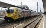 Die 1116 153-8 ÖBB-ÖAMTC Lok bei der Ausfahrt mit dem IC 549 Salzburg-Wien West im Bahnhof St. Pölten am 25.4.2014. Nach St. Pölten fährt er über die Neubaustrecke (Tullnerfeld) bis Wien Hütteldorf.