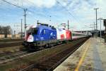 1116 003 EM-Lok Frankreich mit IC546  Licht fr die Welt  bei der Ausfahrt aus dem Bahnhof Wels am 15. Mrz 2008.