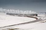 Sonderzug von Wien Heiligenstadt nach Ernstbrunn, aufgenommen kurz nach Hetzmannsdorf. Ab Korneuburg war dieser Zug mit der Dampflok 52.100 bespannt. (17.02.2013)