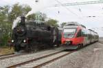 Good old meet modern times: NLB 93.1420 mit dem SR 17457 nach Pamhagen kreuzt am 22.09.2012 im Bf. Frauenkirchen den 4124 007-8 als R 7924.