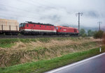 2016 049-6 zieht 1144 249-0 mit einem Güterzug nach Lienz. Aufgenommen am 29.4.2016 aus dem SEV-Bus, nahe Nikolsdorf.