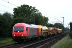 In Laudenbach fährt in der Dämmerung die 2016 905 mit einem Swietelsky Bauzug vorüber.Bild vom 24.5.2016