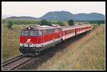 2043 012 fährt am 8.08.2002 mit R4555 zwischen den Haltestellen  Aich im Jauntal  und  Bleiburg Stadt  Richtung Klagenfurt.