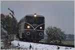 2050.05 GEG fhrt mit dem umgeleiteten Erzleerzug 95635, von Linz Stahlwerke,  ber den Hausruck nach Salzburg und weiter nach Koper. Von Braunau nach Salzburg Gningl war die 2050.05 am Zug.
Munderfing 28.10.2012